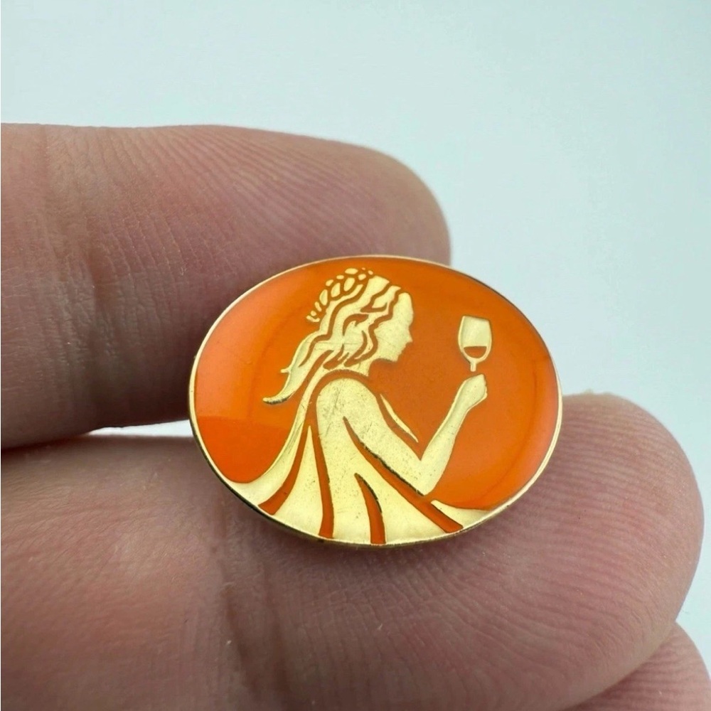 WSET orange lapel pin